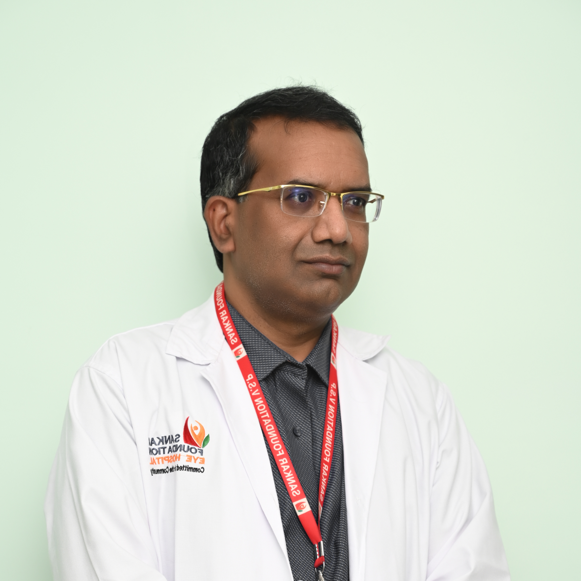 Dr.Tamineni-Raveendra