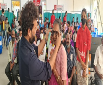 Beneficiaries receiving spectacles from Sri Dorai Swamy garu